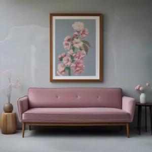Wall art mockup with a dusty pink MCM couch, grey walls, and grey floors, with a wooden frame above the couch.